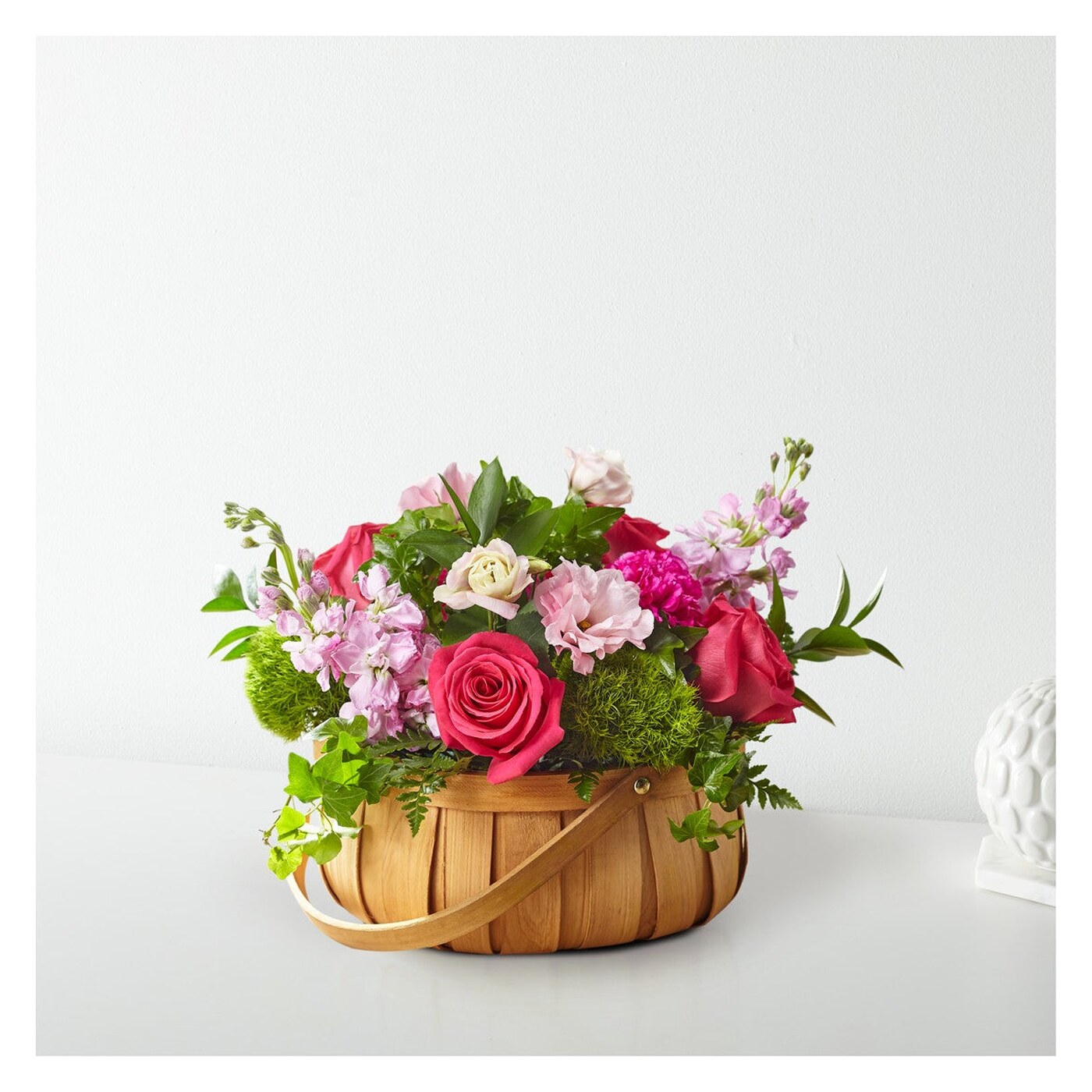 Radiance in Bloom Basket flower arrangement