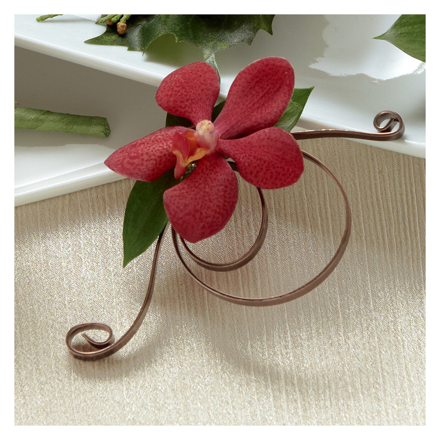 Red Mokara Boutonniere flower arrangement